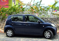 Grand Cayman Car Rentals with Cico Avis Rent A Car, Picture example of a Compact Daihatsu Sirion rental car